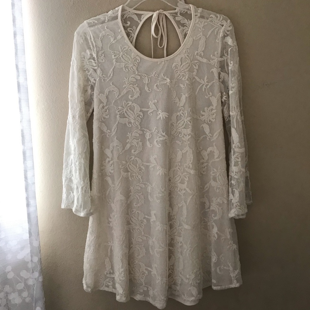 Detailed lace white dress